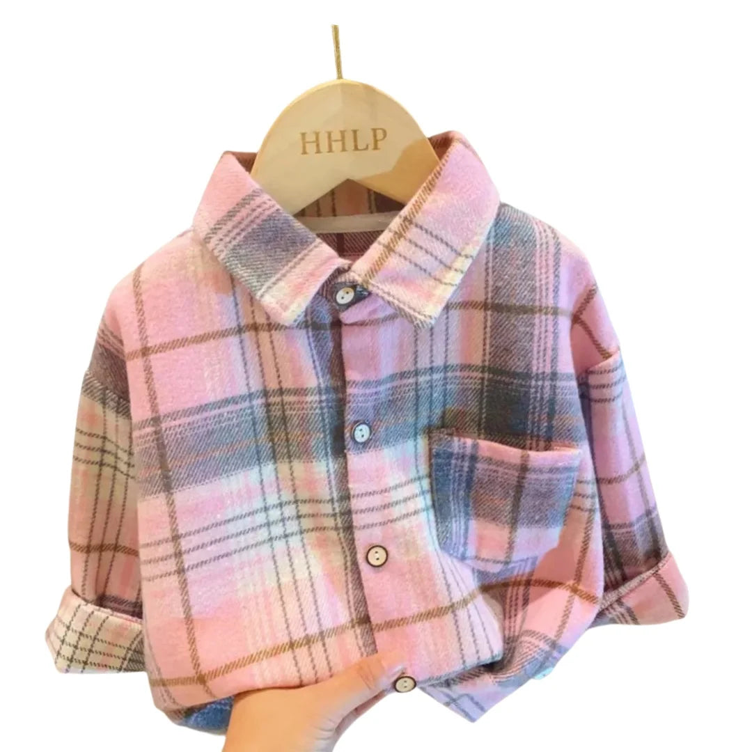 A pink and gray plaid button-up shirt displayed on a wooden hanger.