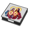 A painting kit featuring an image of the Virgin Mary and Jesus with glowing halos on a note box.