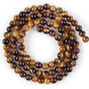 A strand of natural sea sediment jasper and turquoise beads for jewelry making