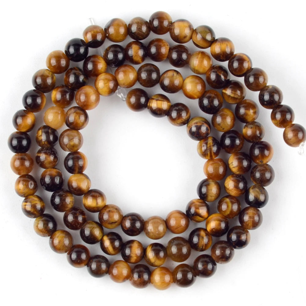 A strand of natural sea sediment jasper and turquoise beads for jewelry making