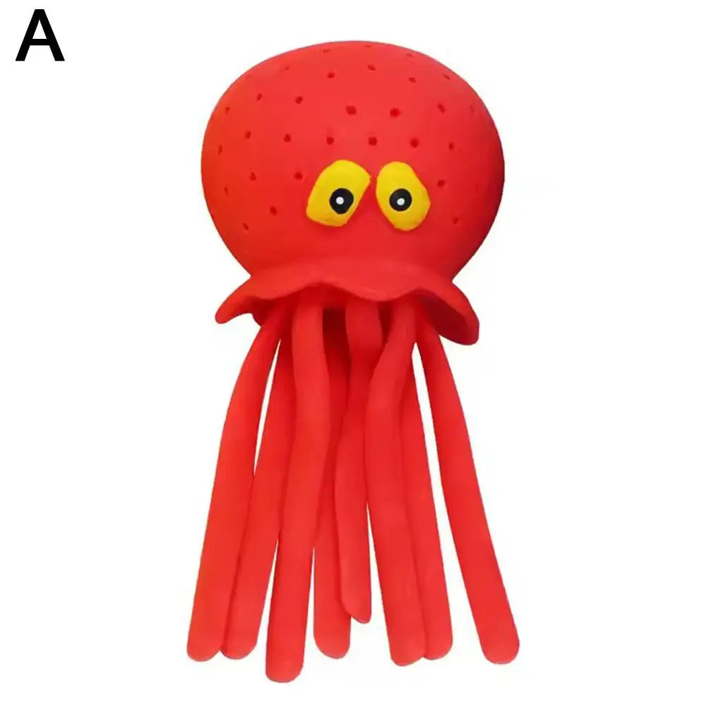 A bright red silicone octopus bath toy with yellow eyes and tentacles.