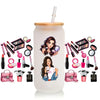A clear cup wrap featuring various makeup products and accessories, including lipsticks, palettes, and brushes.