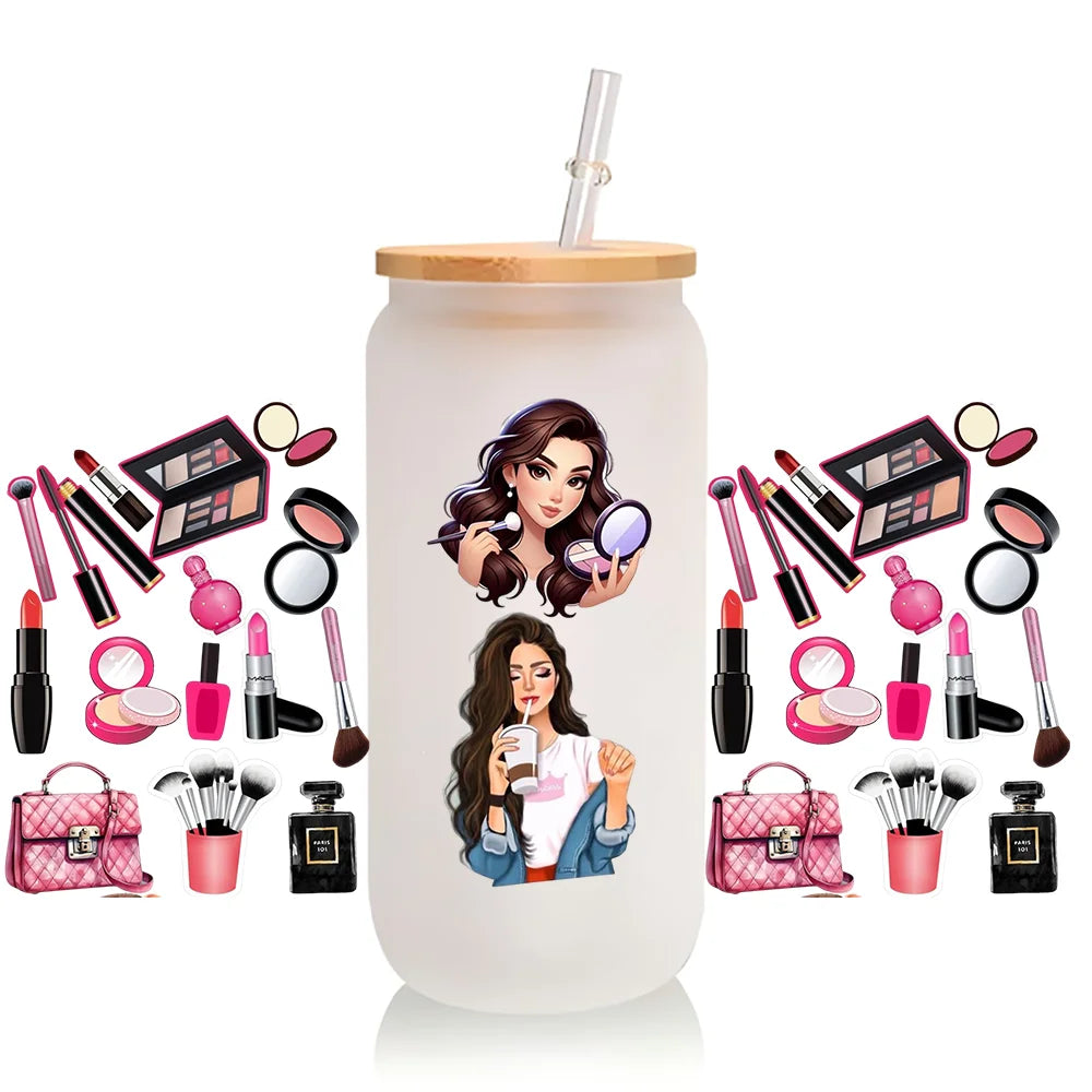 A clear cup wrap featuring various makeup products and accessories, including lipsticks, palettes, and brushes.