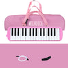 A pink 32-key portable melodica keyboard with a pink carrying bag and accessories.