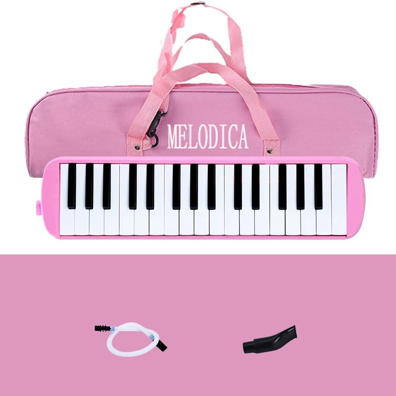 A pink 32-key portable melodica keyboard with a pink carrying bag and accessories.