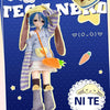 A blue-haired doll dressed in a striped outfit stands on a blue background with accessories and a carrot.