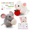 A beginner crochet animal kit featuring a white rabbit and various tools like yarn, needles, and accessories.