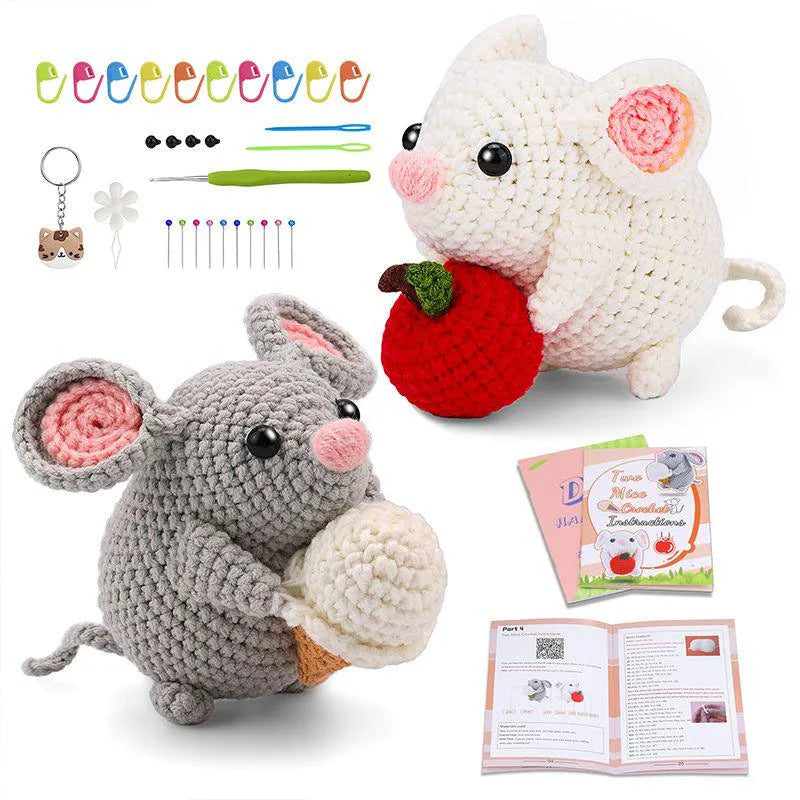 A beginner crochet animal kit featuring a white rabbit and various tools like yarn, needles, and accessories.