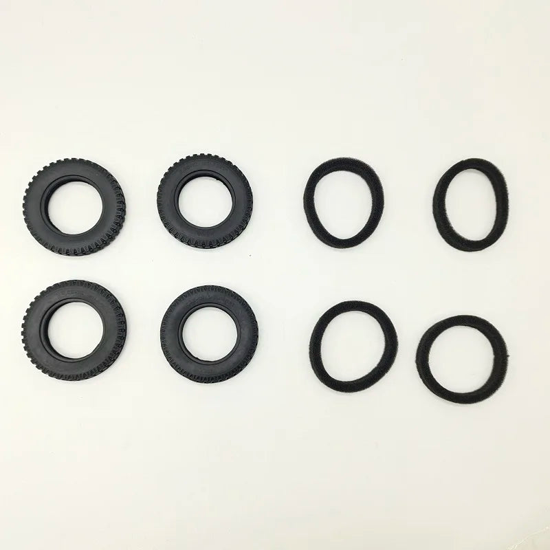 A set of black 1:12 scale RC car steering wheel and interior upgrade parts.
