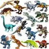 A collection of various dinosaur figures and models in different colors and poses.