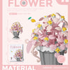 A set of plastic flower blocks in various shapes and colors used to build a model bouquet