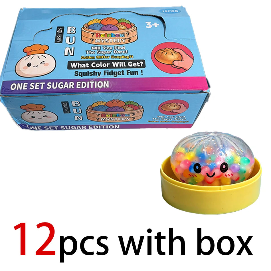 A box containing 12 pieces of glitter dumpling squishy stress relief toys with a yellow container.