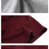 A variety of colored tour cotton t-shirts displayed in various folds and laid flat.