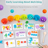 A collection of colorful wooden bead matching cards and loose beads for early learning activities.