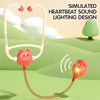 A simulated heartbeat sound lighting design featuring a pink medical toy and tubing in an outdoor setting.