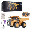 A yellow remote control excavator toy with a YG logo and accessories is shown in its box and assembled form.
