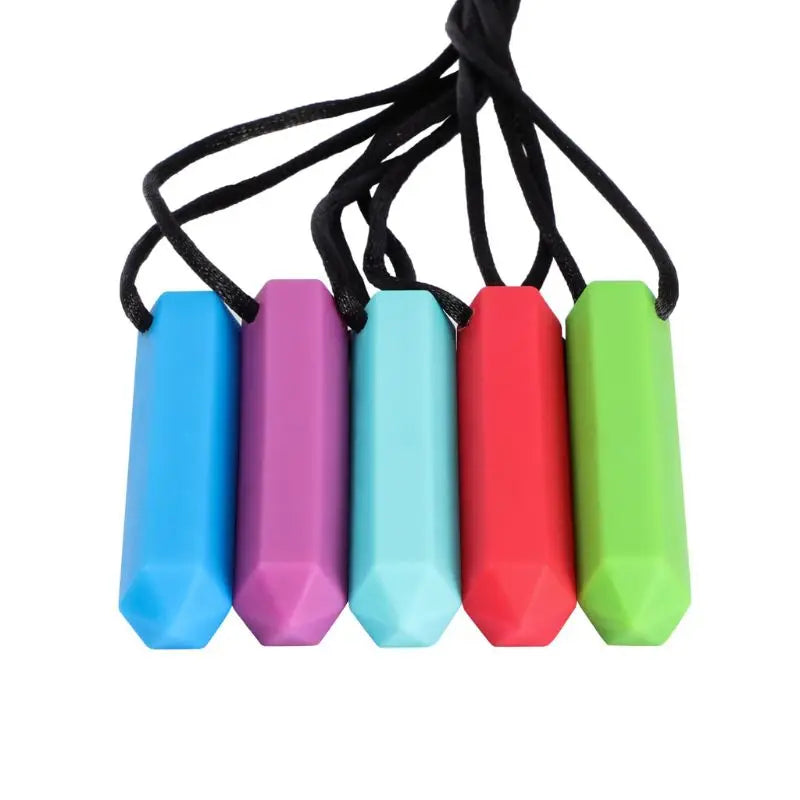 A set of five silicone chew necklaces in blue, purple, green, and red with black cord ties.