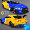 A blue 1:24 scale diecast GTR sports car model with lights and sound