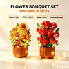A set of building blocks shaped like red roses and yellow sunflowers used to create a flower bouquet for home decor