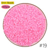 A circular arrangement of 500 pink 5mm beads used for craft projects.