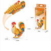 A 3D paper animal puzzle set of a rooster, featuring vibrant orange and yellow colors, shown in various forms.