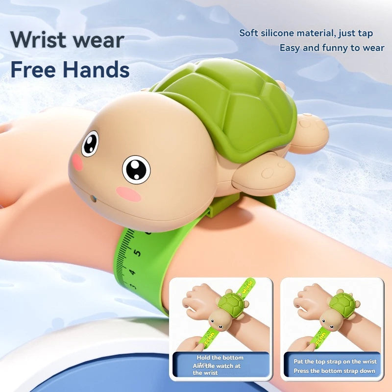 A soft silicone turtle-shaped wrist wear for free hands, shown being worn on a wrist.