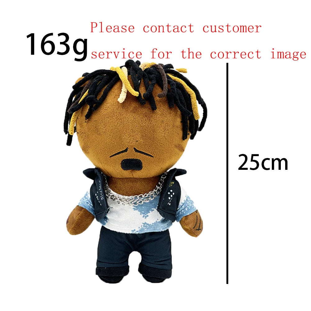 A plush doll resembling Eminem, XXXTentacion, and Frank Ocean with dreadlocks and a light blue shirt.