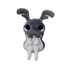 A gray plush doll resembling a creature with large ears and a soft body.