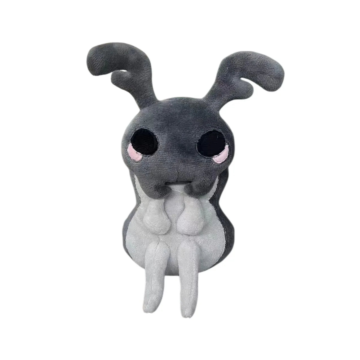 A gray plush doll resembling a creature with large ears and a soft body.