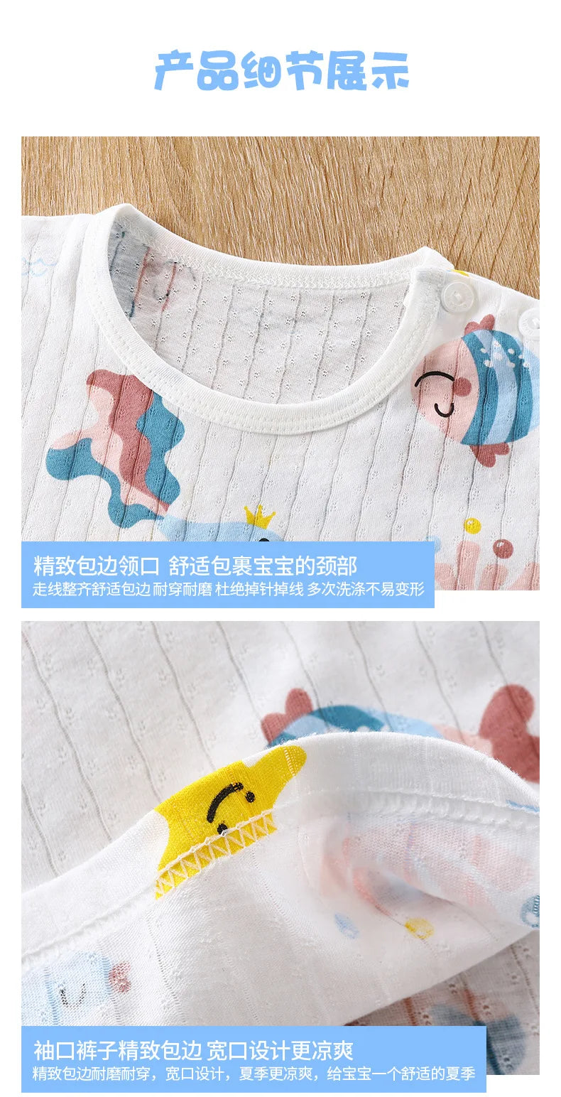 Close-up of a white cotton pajama top featuring a colorful fish design and embroidered details.