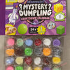 A box of mystery dumpling squishy toys featuring a countdown calendar and various colorful squishy toys.