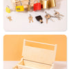 A set of wooden lock and key toys including various sized keys and locks in yellow, red, and gold colors.
