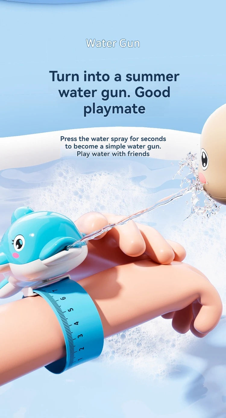A hand is squeezing a water gun shaped like a turtle or dolphin to spray water, with a summer theme background.