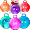 A collection of colorful inflatable hopper balls in orange, purple, red, green, and pink, some being held by a child.