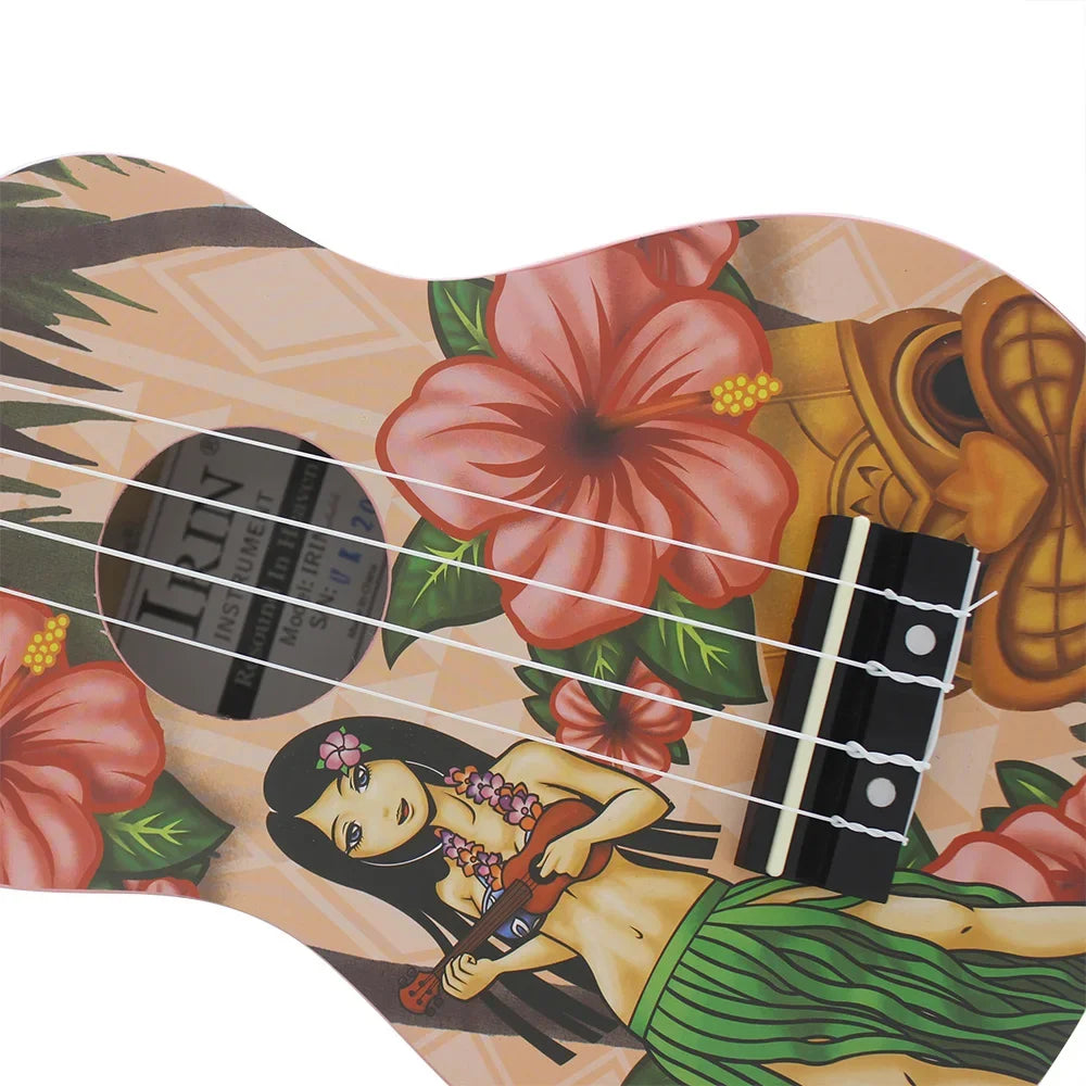 A ukulele starter kit with a Hawaiian design featuring pink flowers and a woman playing the instrument.