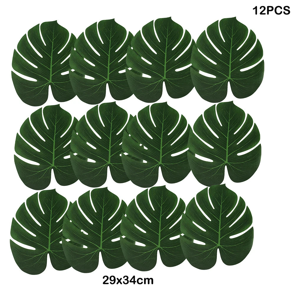 Twelve artificial tropical palm leaves in dark green color displayed on a white background.