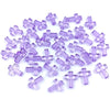 A pile of small, translucent purple acrylic cross beads for jewelry making