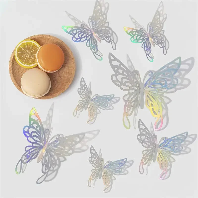 Rose gold 3D butterfly wall stickers displayed on a wooden surface.