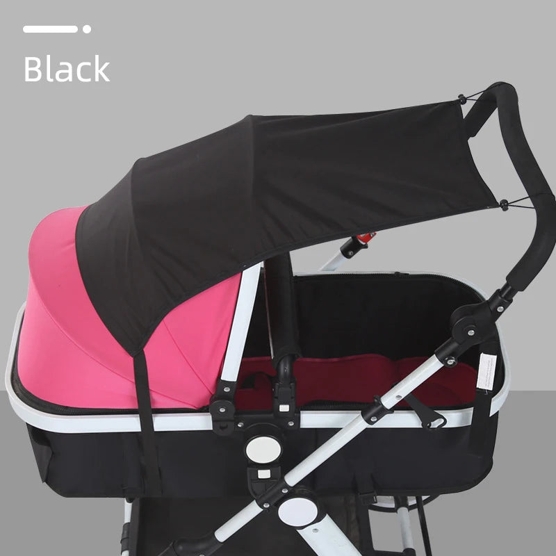 Black universal baby stroller sun shade canopy with pink lining and white frame.