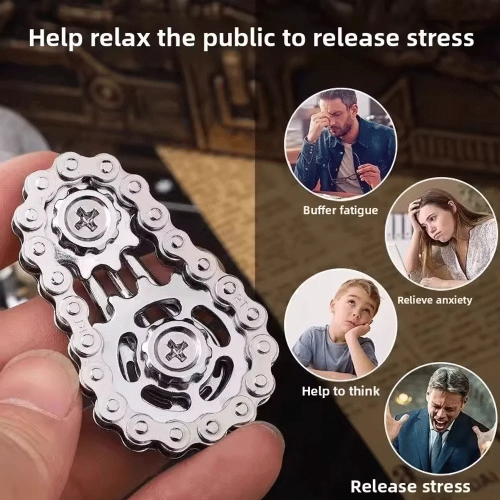 A hand holds a silver metal fidget spinner desk toy designed to help relax the public and relieve stress.