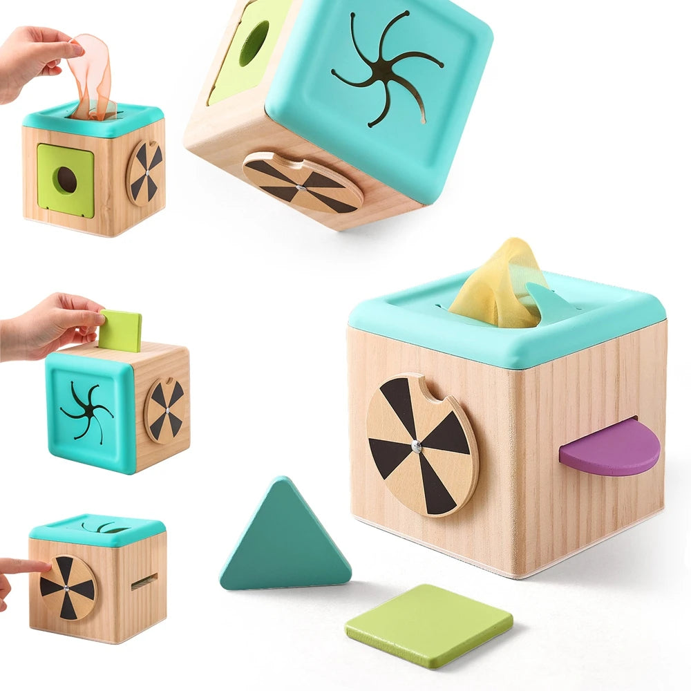 A set of wooden tissue boxes and a green block demonstrating fine motor skills for toddlers.