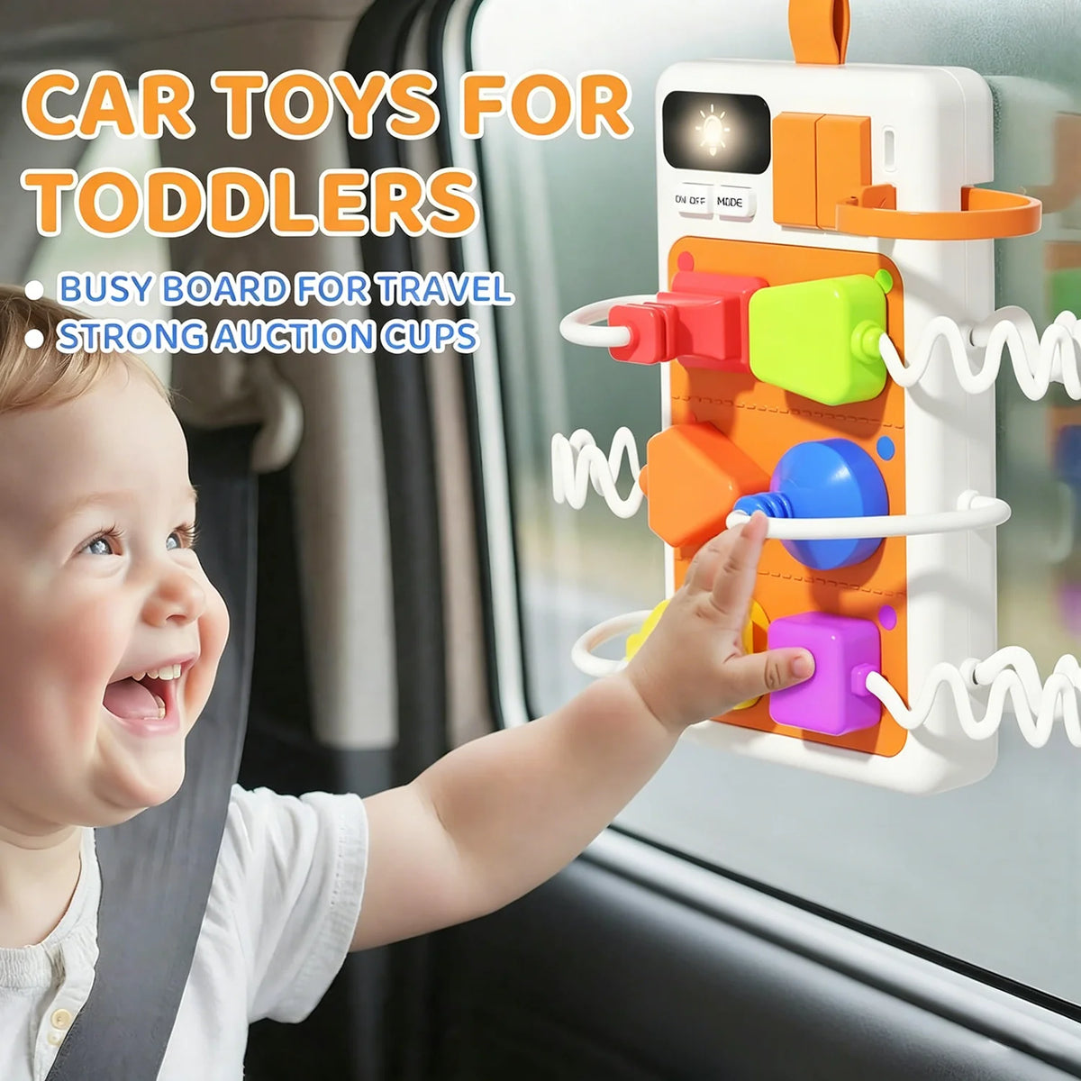 A toddler is interacting with an orange and yellow interactive busy board for travel featuring auction cups and lights.