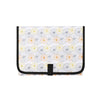 A portable foldable waterproof diaper changing pad with a white background and a pattern of orange and gray floral designs.