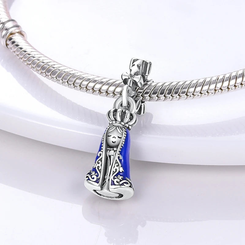 Sterling silver charm beads set featuring cross, angel, and evil eye designs for DIY jewelry making