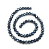 A strand of dark blue faceted crystal beads used for jewelry making