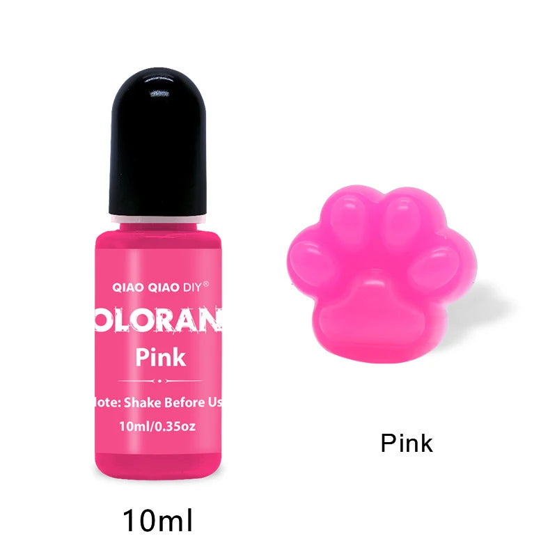 A pink liquid pigment bottle with a black cap labeled Pink for candle and soap making.