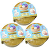 A set of colorful glitter dumpling squishy toys packaged in a yellow container for ages 3 and up