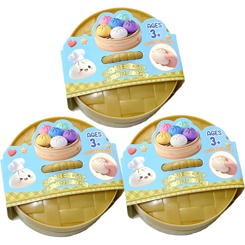 A set of colorful glitter dumpling squishy toys packaged in a yellow container for ages 3 and up