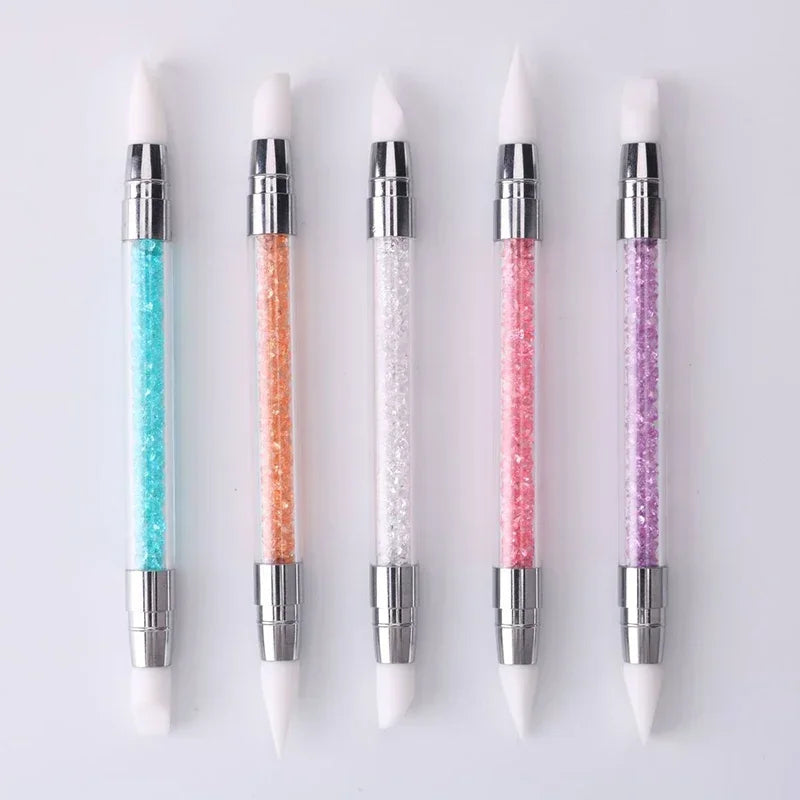 A set of four dual-ended silicone head nail art dotting pens with crystal handles in various colors.