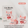 A box of pink cat-themed building blocks with various figures and accessories.